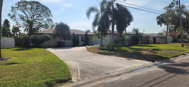 single story home with a front yard