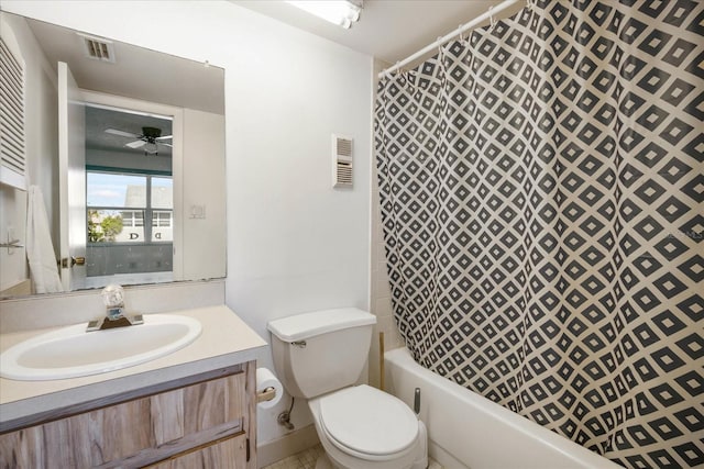 bathroom with vanity, ceiling fan, and toilet