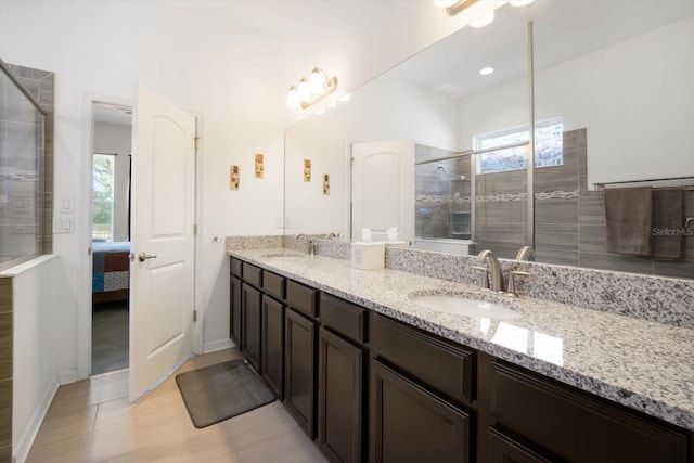 bathroom with vanity and an enclosed shower