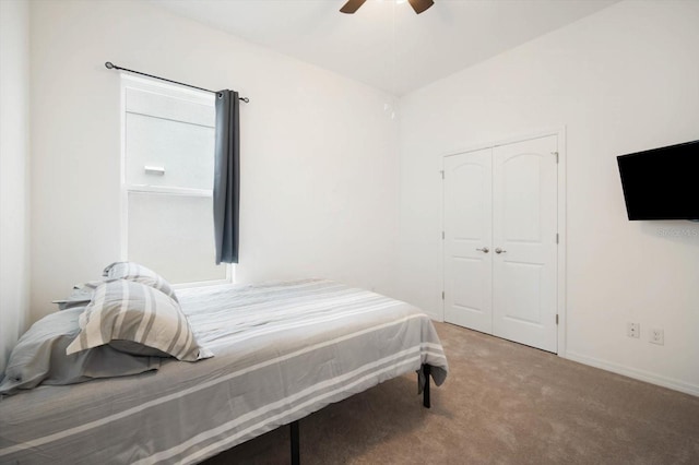 bedroom featuring ceiling fan, carpet floors, and a closet