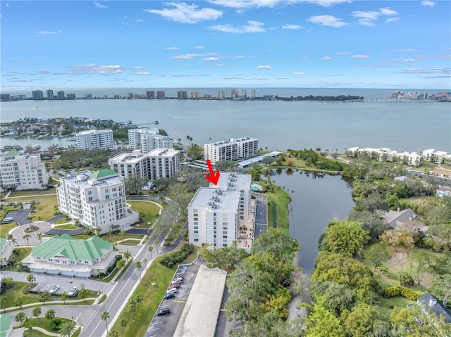 birds eye view of property featuring a water view