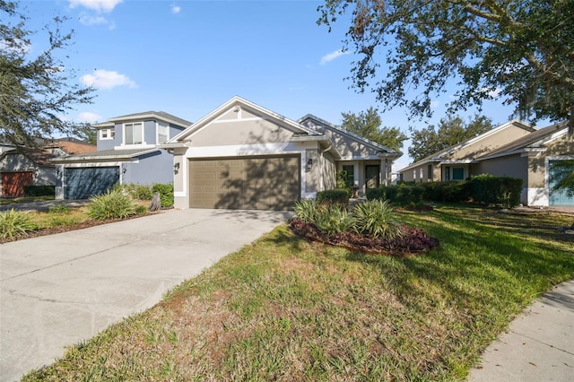 view of front facade featuring a garage and a front lawn