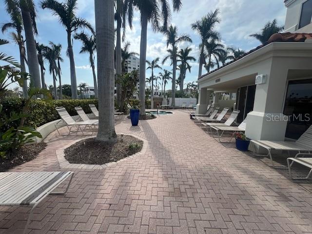 view of patio featuring a community pool