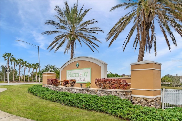 community sign with a lawn