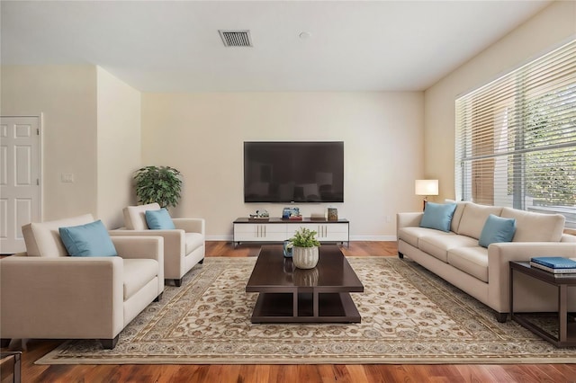 living room with hardwood / wood-style flooring