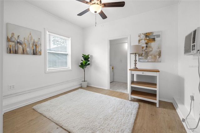 bedroom with ceiling fan and light wood-type flooring