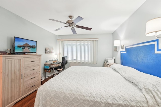 bedroom with dark wood-type flooring and ceiling fan