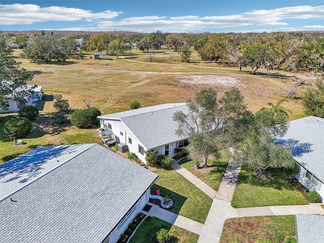 birds eye view of property with a rural view