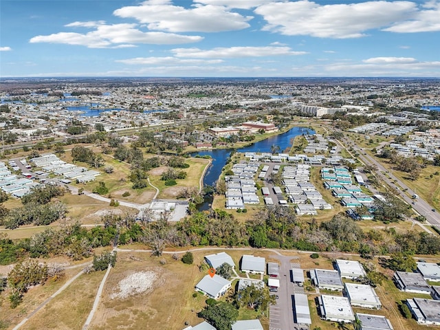 bird's eye view with a water view