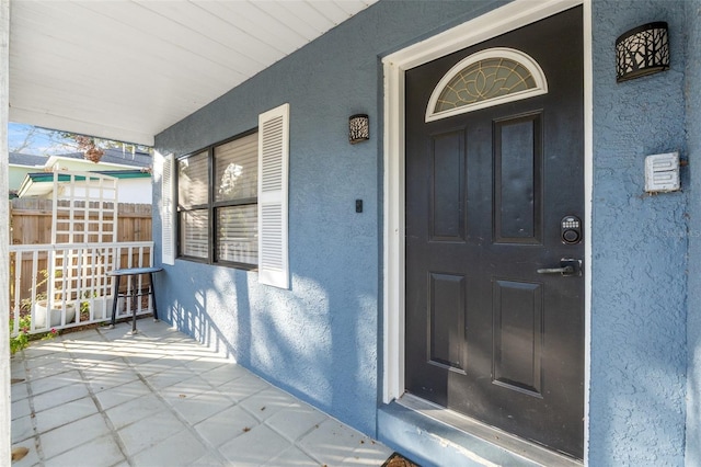 property entrance with a porch