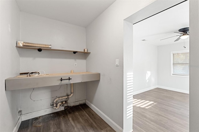 washroom with hardwood / wood-style flooring and ceiling fan