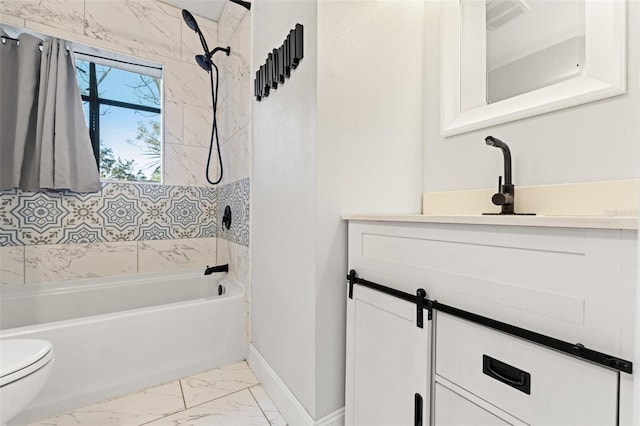 full bathroom with vanity, tiled shower / bath combo, and toilet