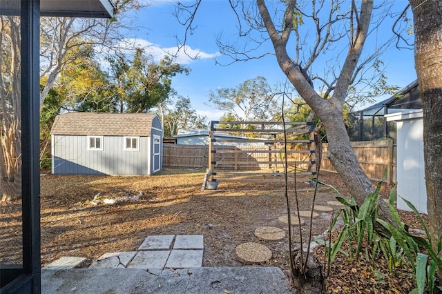 view of yard with a storage shed