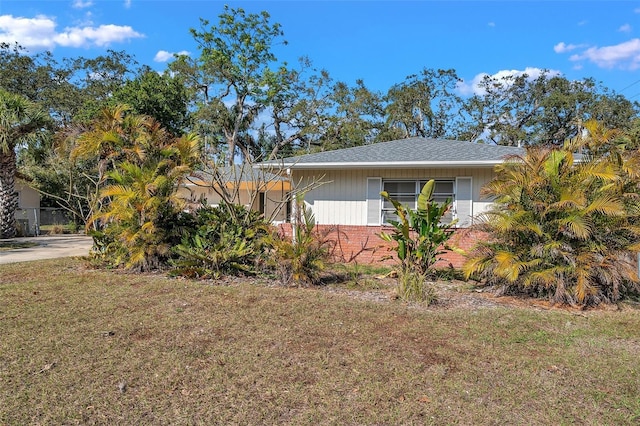 view of home's exterior featuring a lawn