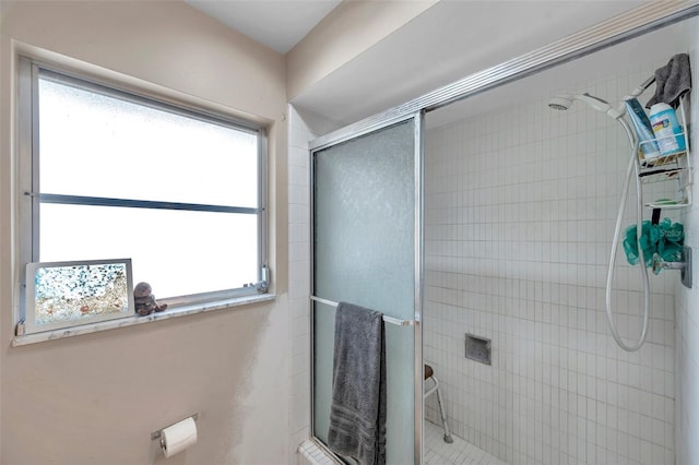 bathroom featuring an enclosed shower