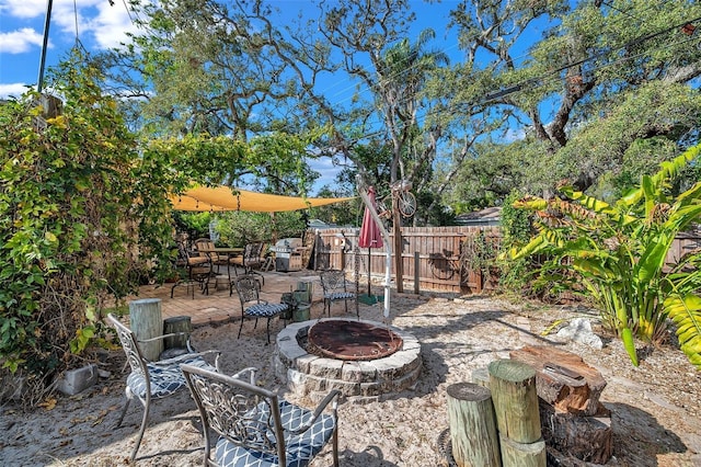 view of patio featuring a fire pit