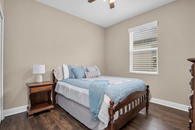 bedroom with ceiling fan and dark hardwood / wood-style flooring