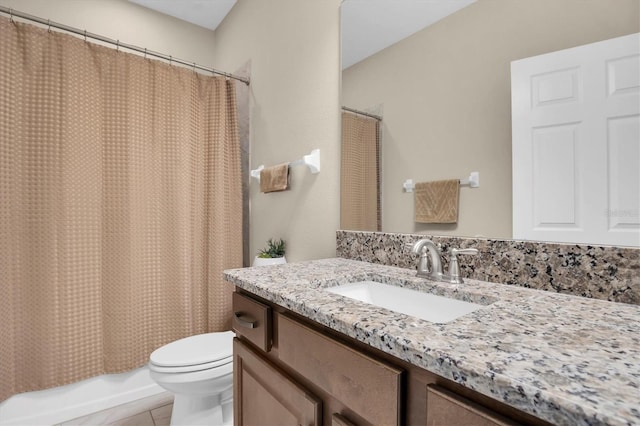 full bathroom with vanity, shower / tub combo, tile patterned flooring, and toilet