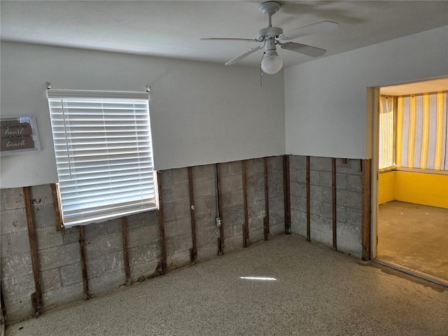 spare room featuring ceiling fan