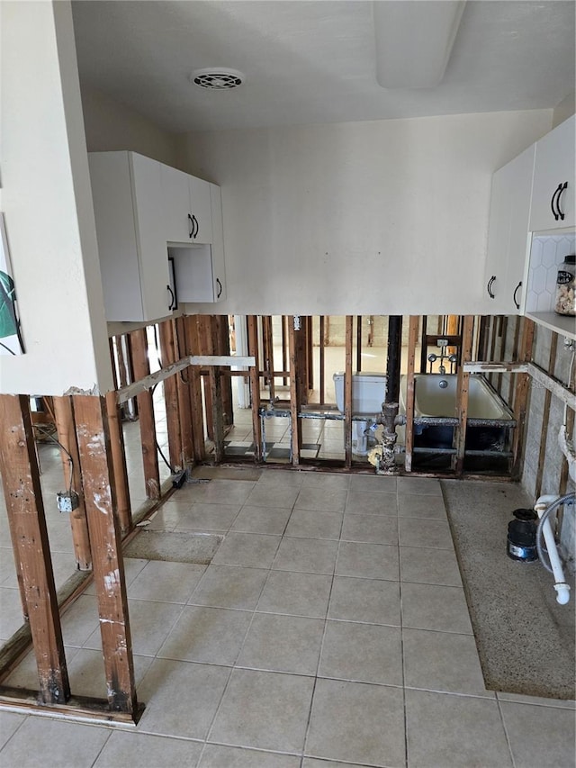 interior space featuring light tile patterned floors