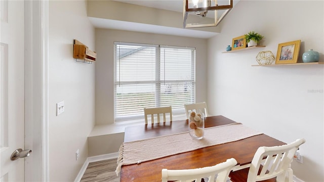 dining area featuring light wood-type flooring