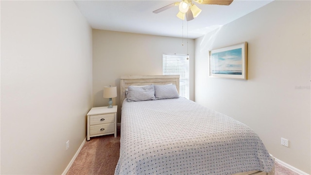 bedroom featuring ceiling fan and carpet flooring