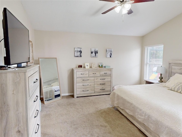 carpeted bedroom featuring vaulted ceiling