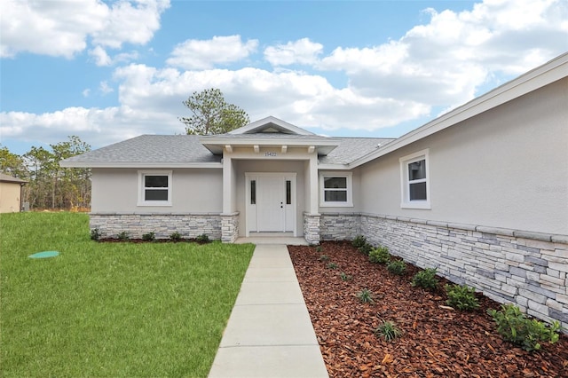 exterior space with a front yard