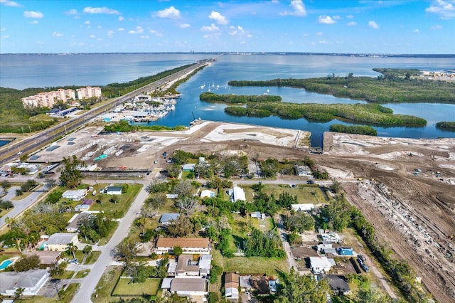 drone / aerial view with a water view