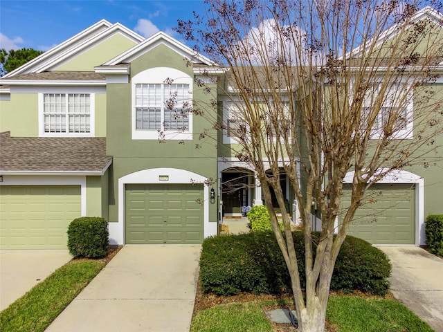 view of front of home with a garage