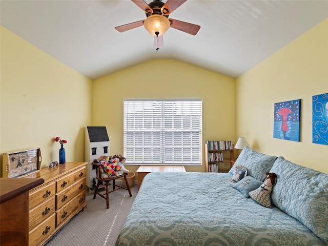 carpeted bedroom with lofted ceiling and ceiling fan