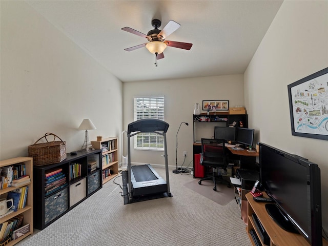 carpeted home office with ceiling fan