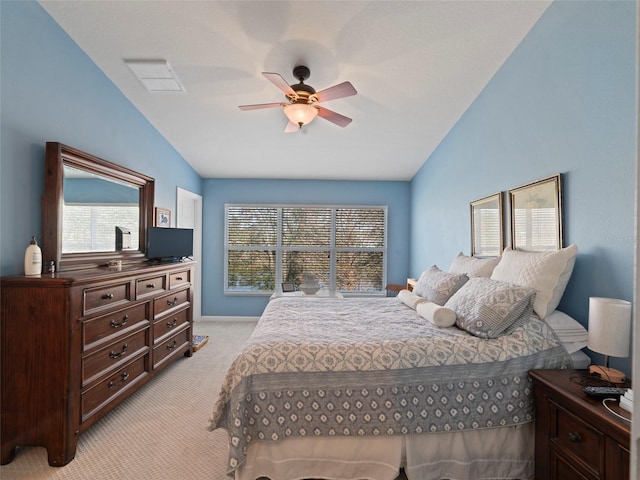 carpeted bedroom with lofted ceiling and ceiling fan