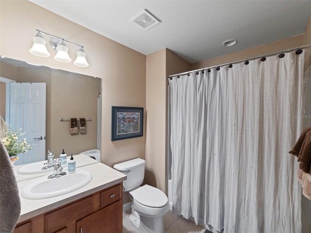 bathroom with tile patterned flooring, vanity, toilet, and a shower with shower curtain