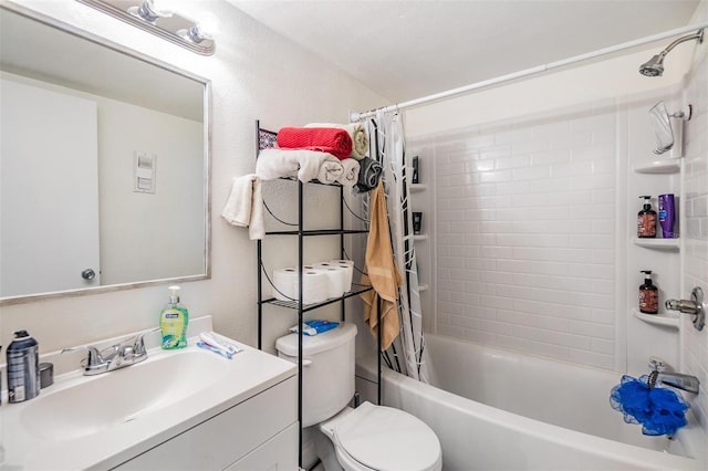 full bathroom with shower / bath combination with curtain, vanity, and toilet