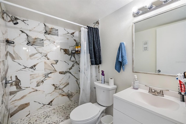 bathroom featuring vanity, toilet, and a shower with shower curtain