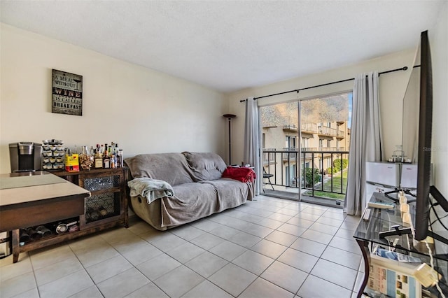 tiled living room with a textured ceiling