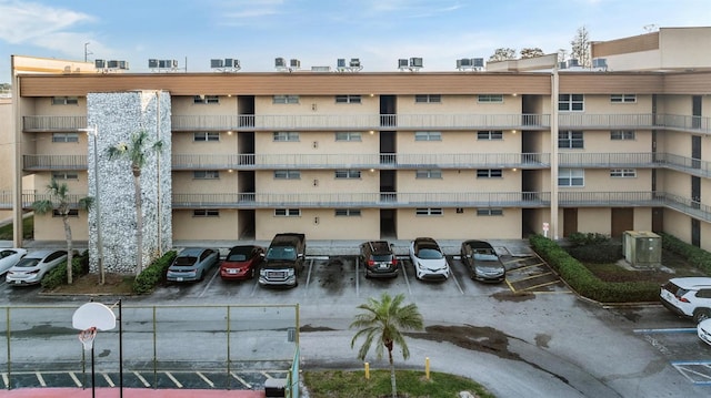 view of property with central air condition unit