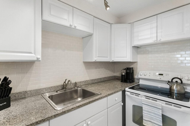 kitchen featuring white cabinetry, sink, white electric range, and backsplash