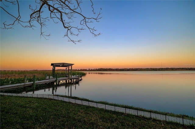 dock area featuring a water view