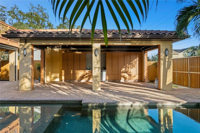 view of swimming pool with a patio area