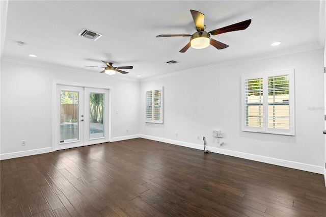 empty room featuring dark hardwood / wood-style flooring, french doors, and a healthy amount of sunlight