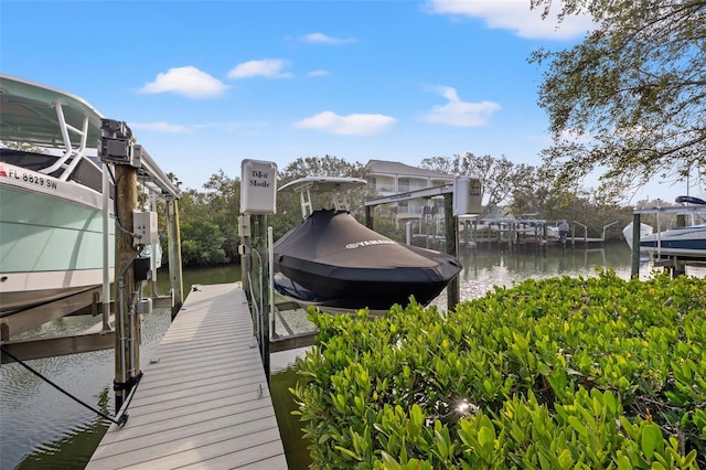 view of dock with a water view