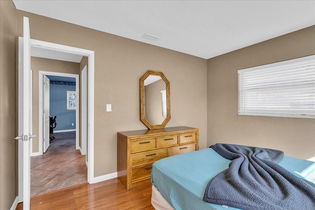 bedroom featuring light hardwood / wood-style flooring