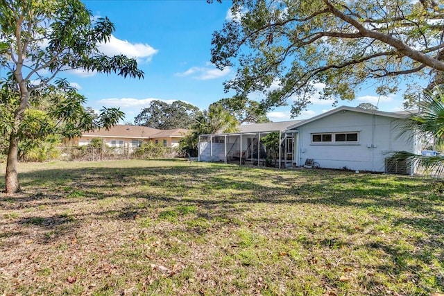 view of yard with a sunroom