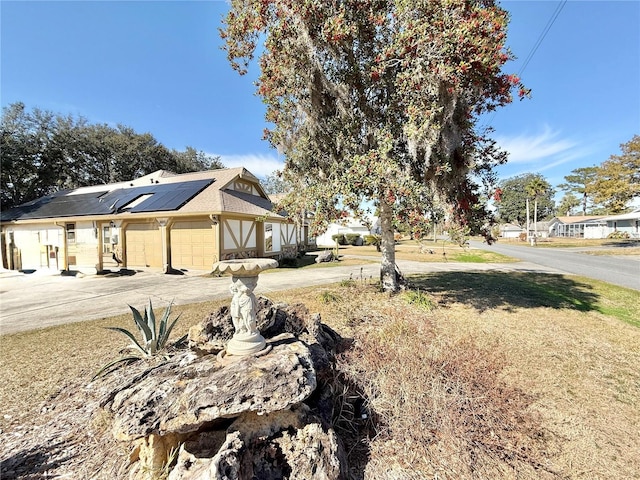 view of yard with a garage