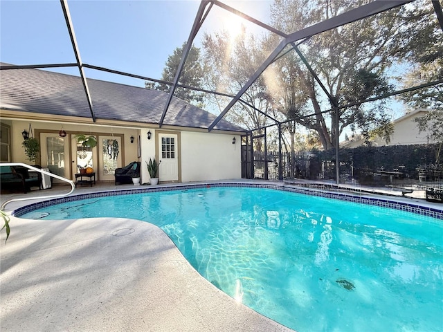 view of pool with a lanai and a patio area