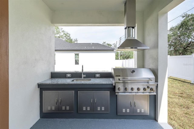 view of patio with sink, grilling area, and exterior kitchen