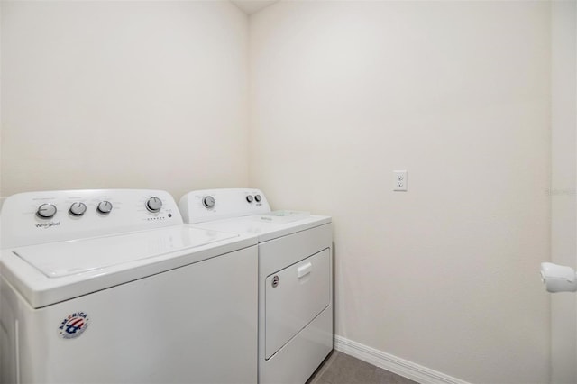 laundry room with independent washer and dryer