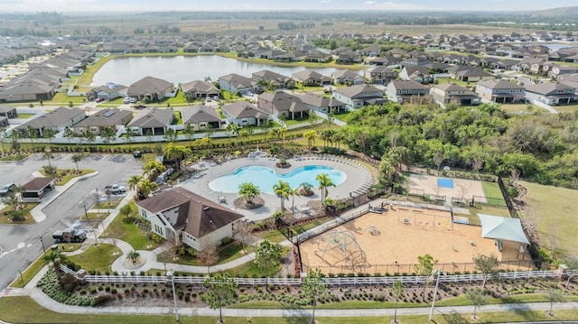 aerial view featuring a residential view and a water view